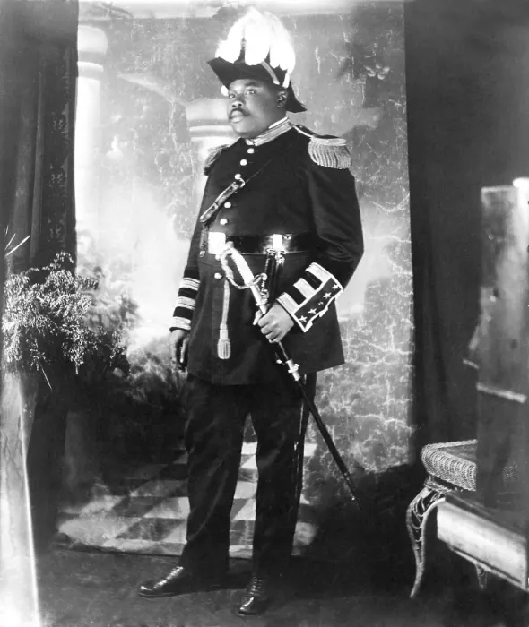 Framed Print : Marcus Garvey (1887-1940), in his flamboyant uniform decorated with plumage, brass buttons, braid, and sword