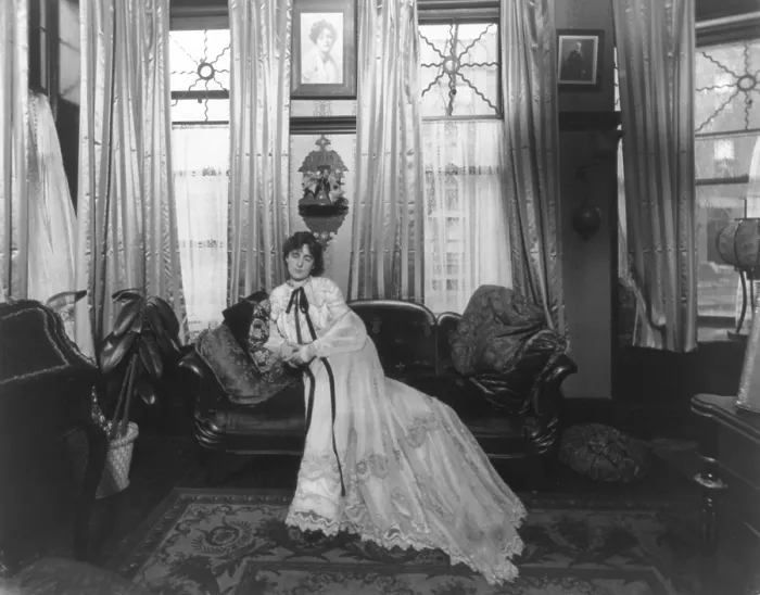 Framed Print : Margaret Anglin, (1876-1958), Canadian born actress, seated on sofa in a elaborately decorated living room. 1903 photo by Joseph Byron Framed Print : Margaret Anglin, (1876-1958), Canadian born actress, seated on sofa in a elaborately decorated living room. 1903 photo by Joseph Byron