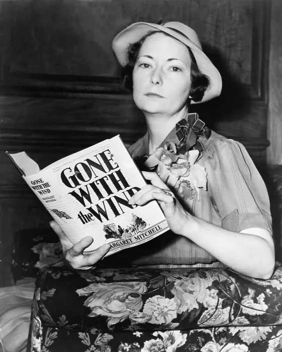 Framed Print : Margaret Mitchell (1900-1949), holding her novel, 'Gone with the Wind, ' the 1937 winner of the Pulitzer Prize Framed Print : Margaret Mitchell (1900-1949), holding her novel, 'Gone with the Wind, ' the 1937 winner of the Pulitzer Prize