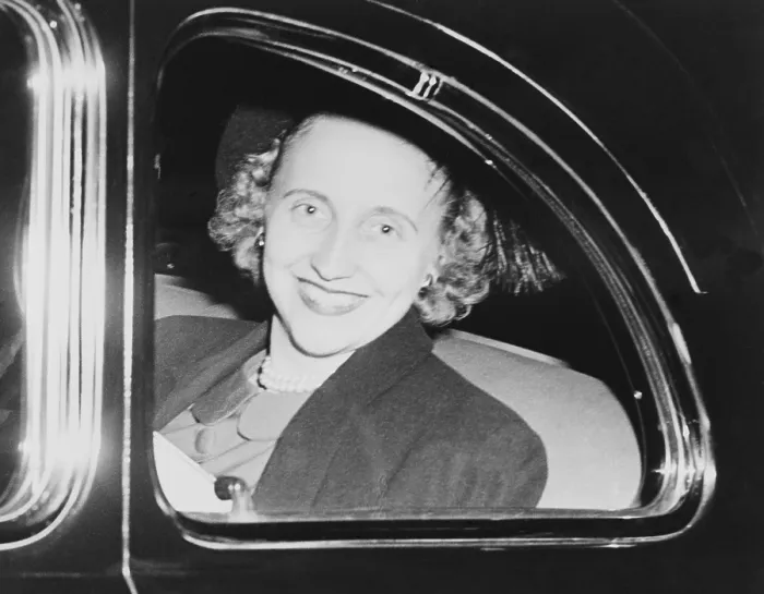 Framed Print : Margaret Truman, looking out the window of an automobile as she returns to Washington after a trip to Florida with her parents, President and Mrs. Harry S. Truman. Ca. 1948