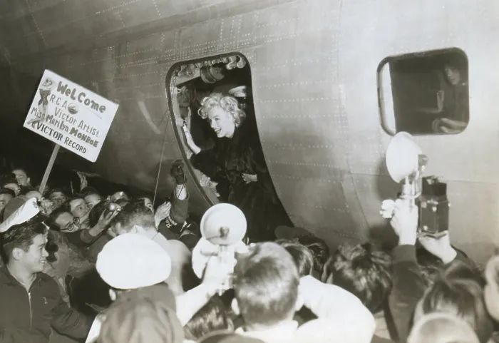 Framed Print : Marilyn Monroe arriving at a U.S. Armed Forces base in Korea. She performed ten shows in four days, in front of audiences that totaled more than 100, 000 soldiers and marines. Ca Framed Print : Marilyn Monroe arriving at a U.S. Armed Forces base in Korea. She performed ten shows in four days, in front of audiences that totaled more than 100, 000 soldiers and marines. Ca