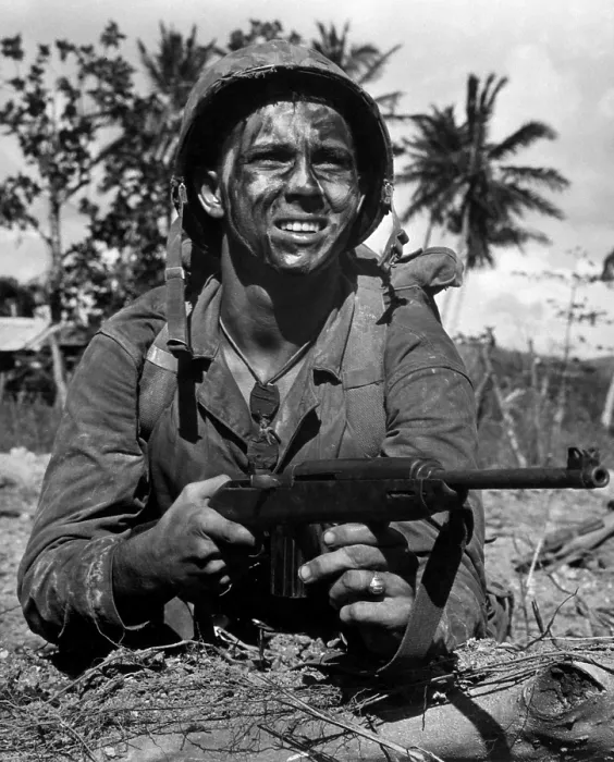 Framed Print : A Marine awaits the signal to go into battle to recapture Guam from Japanese forces. July 1944. (BSLOC_2013-12_218)
