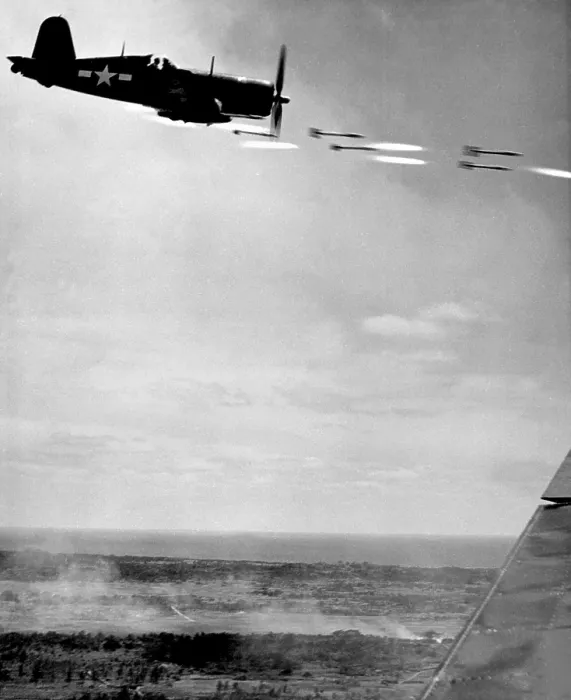 Framed Print : Marine Corsair fighter fires rockets against a Japanese stronghold on Okinawa, June 1945