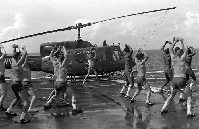 Framed Print : Marines doing jumping jacks on the deck of the amphibious assault ship USS NEW ORLEANS. Aug. 1 1982. (BSLOC_2011_12_245)