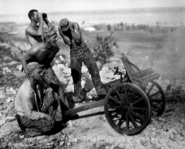 Framed Print : Marines fire a captured Japanese mountain gun in Garapan, Saipan, July 1944. (BSLOC_2013-12_212)