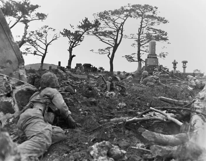 Framed Print : Marines pinned down behind gravestones by Japanese snipers during the Battle of Okinawa. June 1, 1945. World War 2. (BSLOC_2013_13_105)