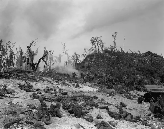 Framed Print : Marines pinned down by Japanese defenders on the beach of Peleliu Island, Sept. 14, 1944. World War 2, Pacific Ocean. (BSLOC_2013_13_20)