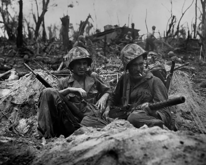 Framed Print : Marines smoke cigarettes, but keep their weapons close in a blasted landscape of Peleliu Island. Sept. 1944. World War 2, Pacific Ocean. (BSLOC_2013_13_32) Framed Print : Marines smoke cigarettes, but keep their weapons close in a blasted landscape of Peleliu Island. Sept. 1944. World War 2, Pacific Ocean. (BSLOC_2013_13_32)