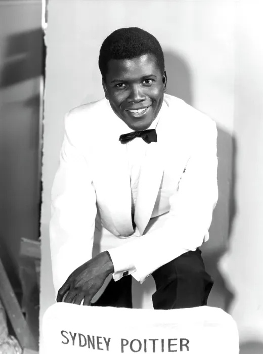 Framed Print : MARK OF THE HAWK, Sidney Poitier, next to his misspelled director's chair, at Elstree Studios, UK, January, 1957 Framed Print : MARK OF THE HAWK, Sidney Poitier, next to his misspelled director's chair, at Elstree Studios, UK, January, 1957