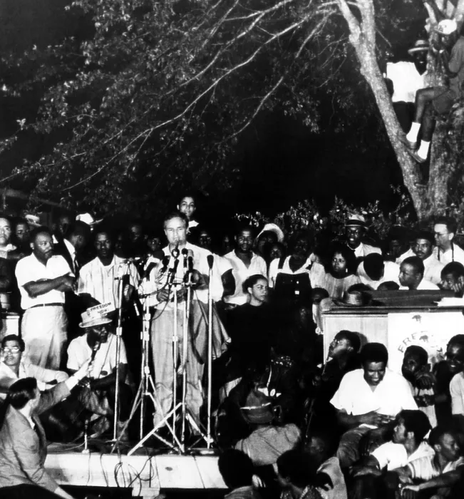 Framed Print : Marlon Brando speaks to civil rights marchers in Tougaloo, Mississippi. Martin Luther King Jr. (left) looks on, 1966. Courtesy: CSU Archives / Everett Collection