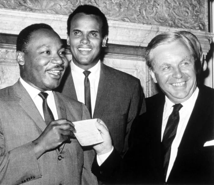 Framed Print : Martin Luther King, Jr. accepting a $100, 000 check from Tore Tellroth, the Swedish Consul General. Harry Belafonte is center. The money was raised in Sweden for Dr