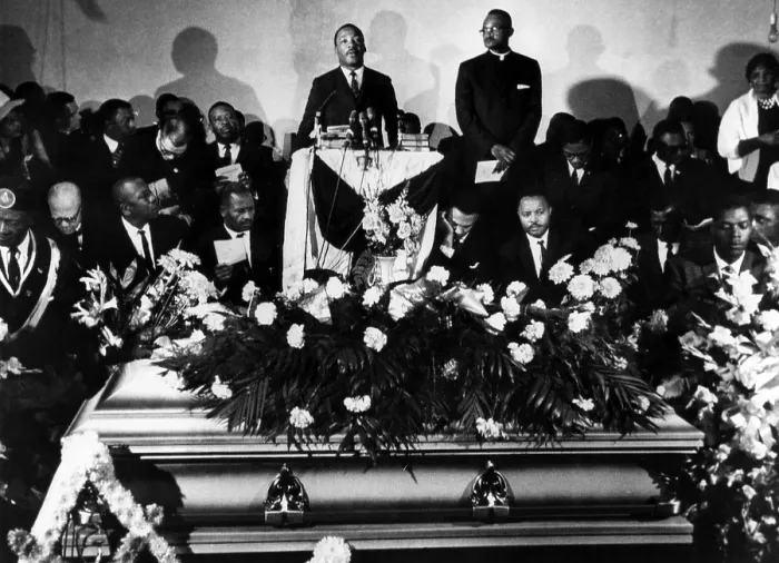 Framed Print : Martin Luther King Jr. (center, standing), giving a eulogy for Jimmie Lee Jackson at a funeral service in Marion, Alabama, March 3, 1965