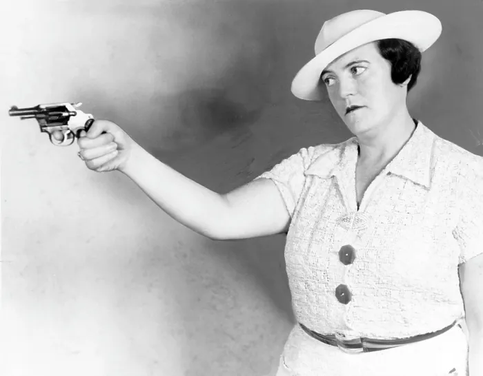 Framed Print : Mary A. Shanley, New York City detective, holding service revolver
