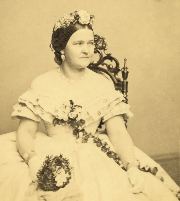 Framed Print : Mary Todd Lincoln as First Lady, holding flowers, 1861. Carte de visite by Mathew Brady (BSLOC_2016_14_41) Framed Print : Mary Todd Lincoln as First Lady, holding flowers, 1861. Carte de visite by Mathew Brady (BSLOC_2016_14_41)