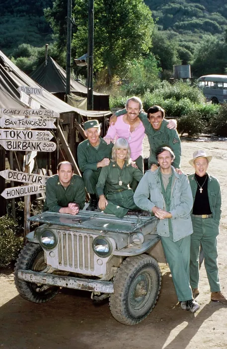 Framed Print : MASH, (aka M*A*S*H*), clockwise from lower left: David Ogden Stiers, Harry Morgan, Mike Farrell, Jamie Farr, William Christopher, Alan Alda, Loretta Swit, (1982), 1972-1983