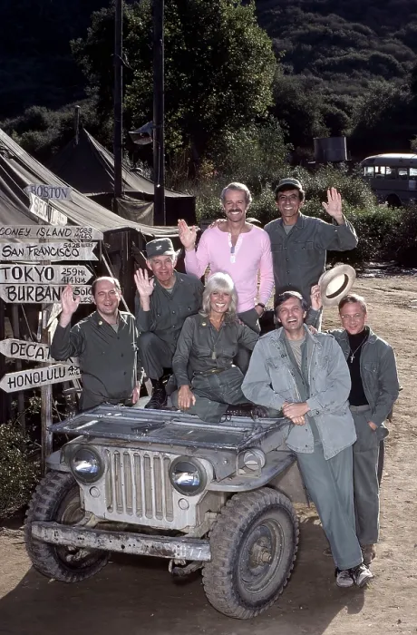 Framed Print : MASH, (aka M*A*S*H*), from left: David Ogden Stiers, Harry Morgan, Loretta Swit, Mike Farrell (pink), Alan Alda (front), Jamie Farr, William Christopher, (1982), 1972-1983 Framed Print : MASH, (aka M*A*S*H*), from left: David Ogden Stiers, Harry Morgan, Loretta Swit, Mike Farrell (pink), Alan Alda (front), Jamie Farr, William Christopher, (1982), 1972-1983