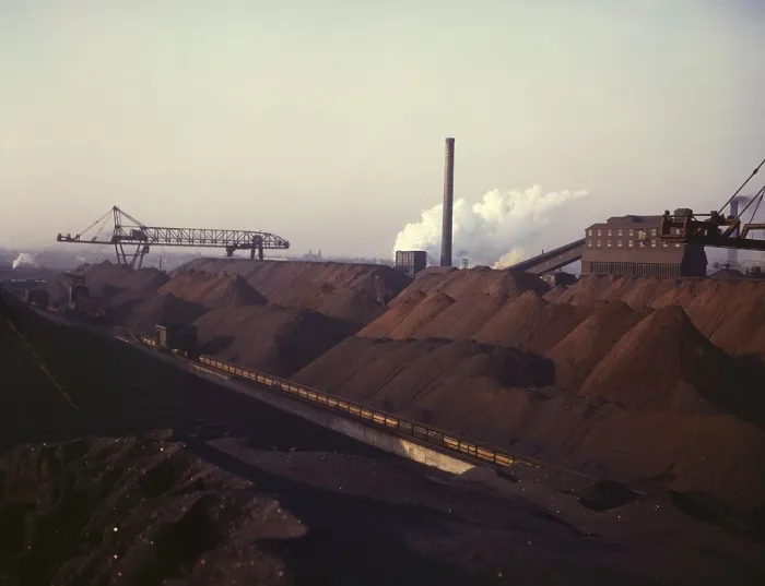Framed Print : Massive stock pile of coal and iron ore, at the Hanna furnaces of the Great Lakes Steel Corporation in Detroit, Michigan. 1942