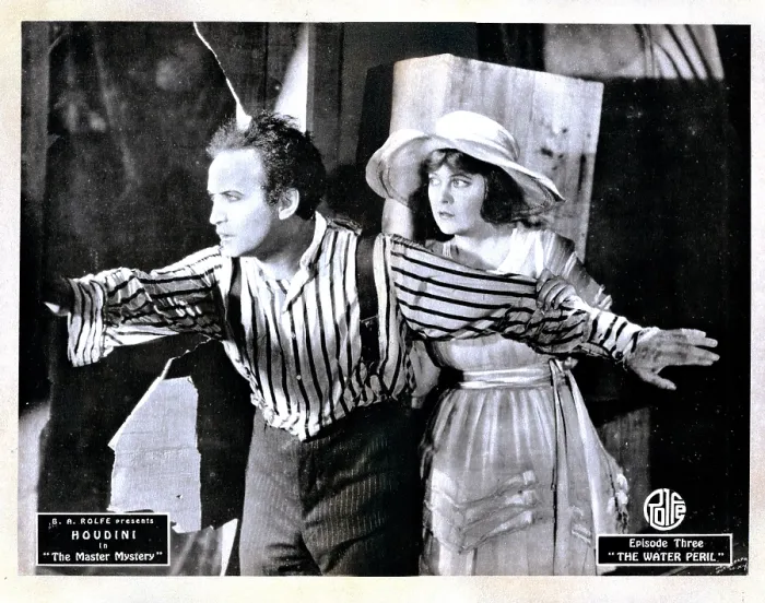 Framed Print : THE MASTER MYSTERY, from left, Harry Houdini, Marguerite Marsh, episode three, The Water Peril, 1919