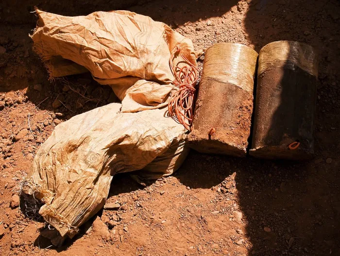 Framed Print : Materials for making an improvised explosive device IED found Helmand province Afghanistan include two 35 pound IED 15 feet of detonation cord