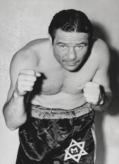 Framed Print : Max Baer, former World Heavyweight Champion preparing for a bout with Lou Nova. Baer lost the Yankee Stadium fight on June 6, 1939. - (BSLOC_2014_17_146)
