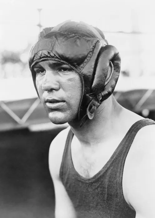 Framed Print : Max Schmeling, wearing protective helmet, and Vaseline. He was training for the June 21, 1932 title bout with Jack Sharkey, which he lost. (BSLOC_2013_9_28)