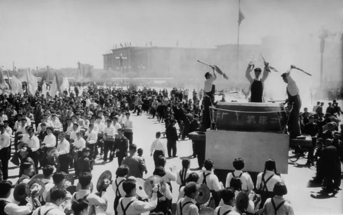 Framed Print : May Day in Beijing. People parade past a band with a massive drum. Tiananmen Square, Beijing, China. May 1, 1963