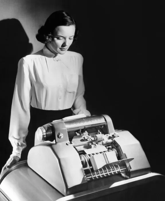 Framed Print : Mechanized currency counter, the Tichometer accurately counts dollar bills at the rate of 1000 per minute