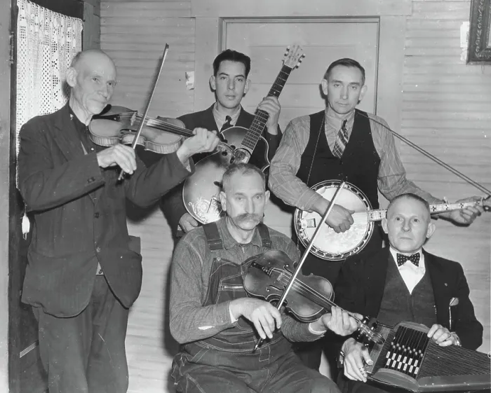 Framed Print : Members of the Bog Trotters Band posed holding their instruments, Galax, Va, 1937