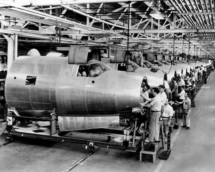 Framed Print : Men assemble aircraft at a Chrysler bomber plant, 1943. Courtesy: CSU Archives / Everett Collection