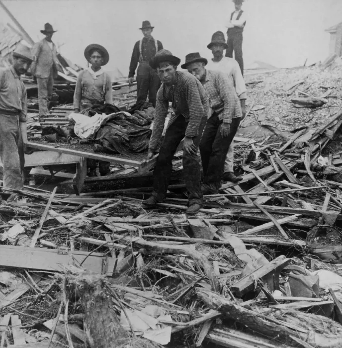 Framed Print : Men carrying bodies on stretcher, surrounded by wreckage of the hurricane in Galveston, Texas, Sept. 1900. The disaster occurred on Sept Framed Print : Men carrying bodies on stretcher, surrounded by wreckage of the hurricane in Galveston, Texas, Sept. 1900. The disaster occurred on Sept
