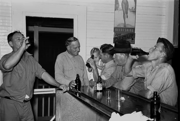 Framed Print : Men drinking beer at the bar in Pilottown, Louisiana, in during the Great Depression