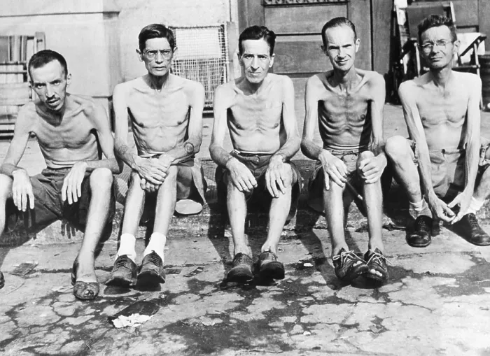 Framed Print : Five men liberated from the Santo Tomas internment camp in Manila, Feb. 23, 1945. L-R: Arehugo G