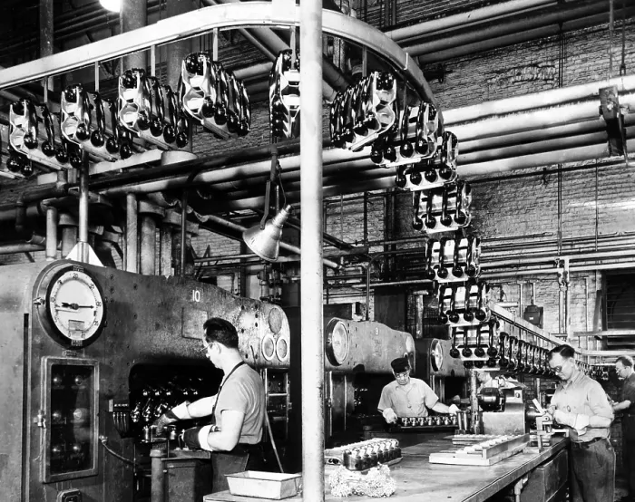 Framed Print : Men make phones for civilian use at Western Electric Company. They made thousands of phones for military use during the war, 1945. Courtesy: CSU Archives / Everett Collection
