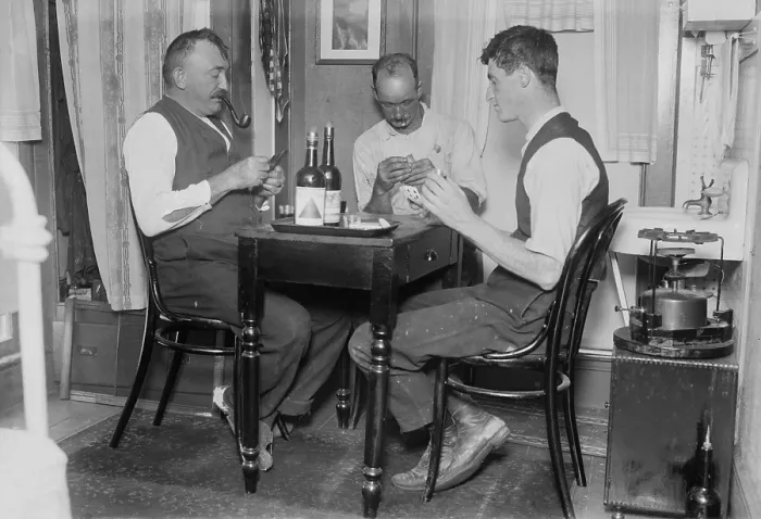 Framed Print : Two men playing cards in a home in Broad Channel, Queens, New York, c. 1910 Framed Print : Two men playing cards in a home in Broad Channel, Queens, New York, c. 1910