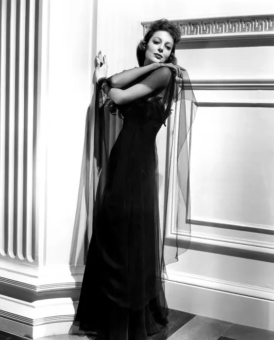 Framed Print : FOUR MEN AND A PRAYER, Loretta Young, in a black chiffon evening gown by Royer, 1938. 20th Century Fox, TM & Copyright / courtesy Everett Collection