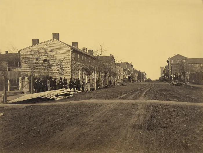 Framed Print : Men standing near the site of the Globe Tavern, the residence of Lincoln's family, during the first year (1842-43) of his marriage to Mary Todd, in Springfield, Illinois Framed Print : Men standing near the site of the Globe Tavern, the residence of Lincoln's family, during the first year (1842-43) of his marriage to Mary Todd, in Springfield, Illinois