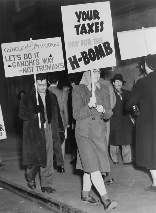 Framed Print : Men and women picketing against the use of tax dollars for the development of nuclear weapons. New York City, March 15, 1950. On Jan