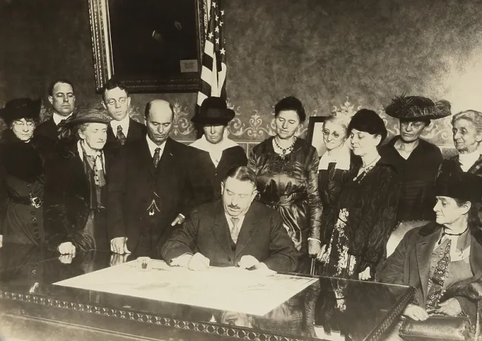 Framed Print : Men and women witness as Colorado governor, Oliver H. Shoup, signs a ratification document for the 19th amendment granting woman's suffrage. Dec. 12, 1919 Framed Print : Men and women witness as Colorado governor, Oliver H. Shoup, signs a ratification document for the 19th amendment granting woman's suffrage. Dec. 12, 1919