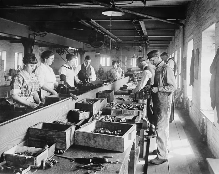 Framed Print : Men and Women working on an assembly line in the Express Spark Plug Co. Ca. 1920, in the Washington, D.C. area. (BSLOC_2015_16_229)