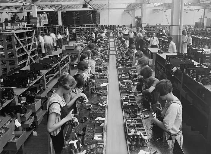 Framed Print : Men and women working on a radio assembly line in Washington D.C. area. 1925