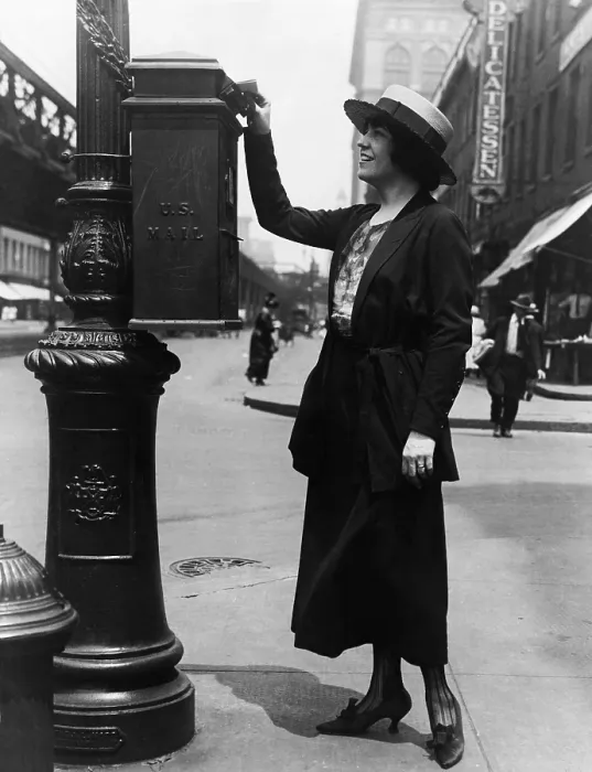 Framed Print : Merle Alcock opera contralto mailing a letter in mailbox attached to a post on a street corner. New York City ca. 1920. (BSLOC_2010_18_87) Framed Print : Merle Alcock opera contralto mailing a letter in mailbox attached to a post on a street corner. New York City ca. 1920. (BSLOC_2010_18_87)