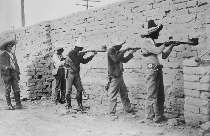 Framed Print : Mexican Revolutionary soldiers shoot through a brick wall in fighting in Juarez, April-May, 1911. (BSLOC_2016_13_25.jpg ) Framed Print : Mexican Revolutionary soldiers shoot through a brick wall in fighting in Juarez, April-May, 1911. (BSLOC_2016_13_25.jpg )