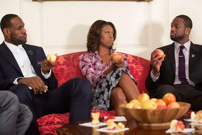 Framed Print : Miami Heat players LeBron James (left) and Dwyane Wade, with First Lady Michelle Obama Framed Print : Miami Heat players LeBron James (left) and Dwyane Wade, with First Lady Michelle Obama