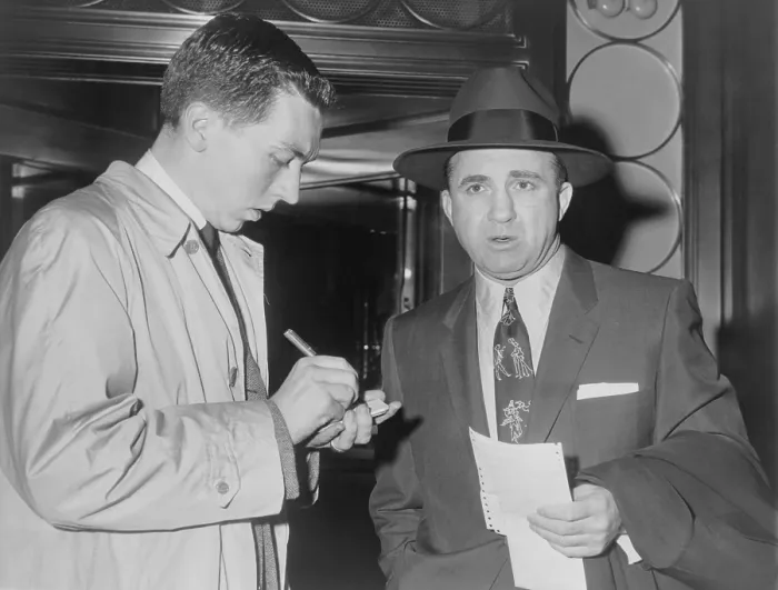 Framed Print : Mickey Cohen (1913-1976), speaking with reporter in New York City on May 20, 1957. In the 1950's, Cohen was a celebrity gangster with many Hollywood friends
