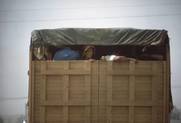Framed Print : Migrant agricultural workers taking shelter in a truck during a dust storm, May 1972. Four corners region of Utah. Photo for EPA by Terry Eller. (BSLOC_2014_13_136)