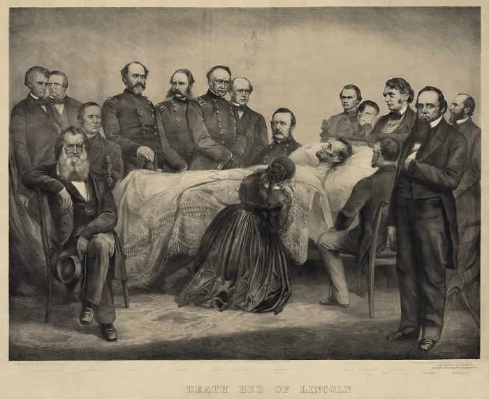 Framed Print : Military commanders and Cabinet members witness Abraham Lincolns death on April 15, 1865. Mary Lincoln kneels at her husbands bedside in a commemorative lithograph