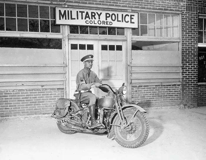 Framed Print : A Military Police officer posed on his motorcycle before making his rounds. Columbus, Georgia, ca. 1942-1954