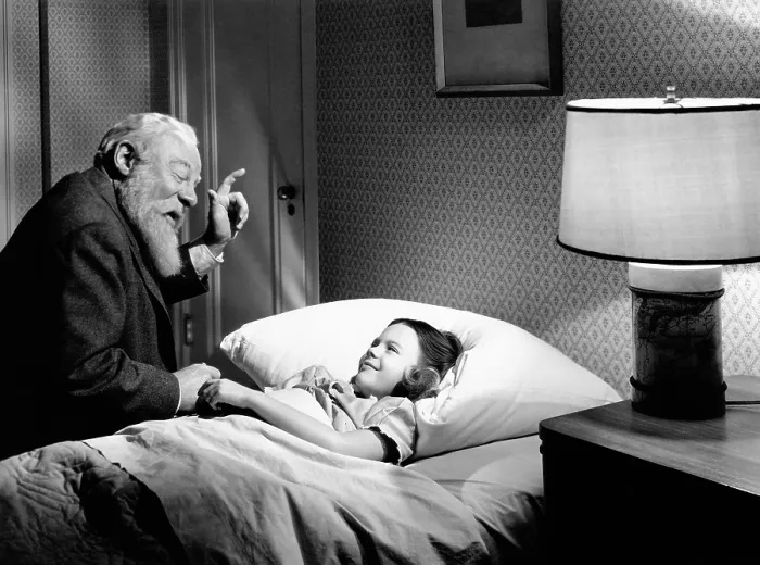 Framed Print : MIRACLE ON 34TH STREET, from left, Edmund Gwenn, Natalie Wood, 1947, TM and copyright 20th Century Fox Film Corp. All rights reserved / Courtesy: Everett Collection Framed Print : MIRACLE ON 34TH STREET, from left, Edmund Gwenn, Natalie Wood, 1947, TM and copyright 20th Century Fox Film Corp. All rights reserved / Courtesy: Everett Collection