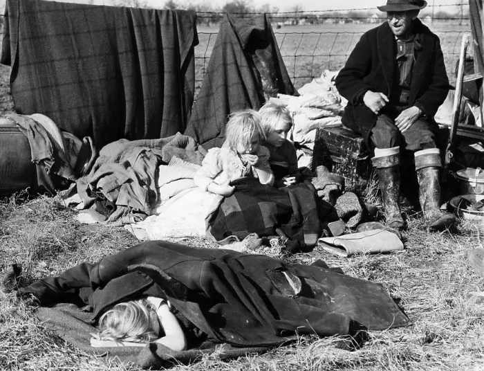 Framed Print : A Misouri sharecropper with his three little children sit with their posessions on the edge of a state highway after being evicted from their home. ca. 1939 Framed Print : A Misouri sharecropper with his three little children sit with their posessions on the edge of a state highway after being evicted from their home. ca. 1939