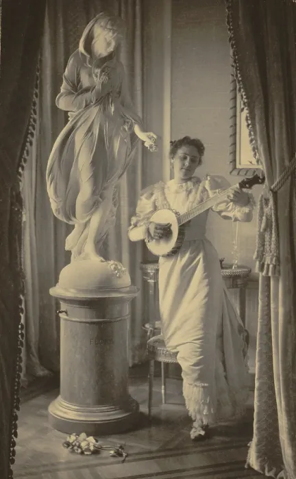 Framed Print : Miss Apperson playing banjo beside statue of Flora in Sen. George Hearst's residence, Washington, D.C. 1895 photo by Frances Benjamin Johnston Framed Print : Miss Apperson playing banjo beside statue of Flora in Sen. George Hearst's residence, Washington, D.C. 1895 photo by Frances Benjamin Johnston